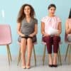 three women waiting for an interview